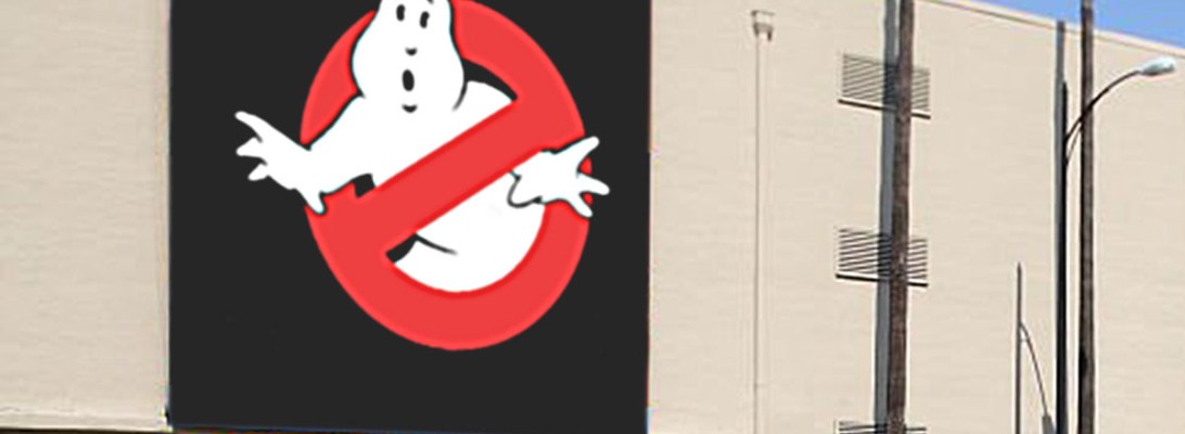 exterior building with an enormous sign with the Ghostbusters logo, but no text